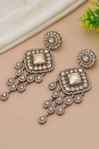Gold color kundan earrings