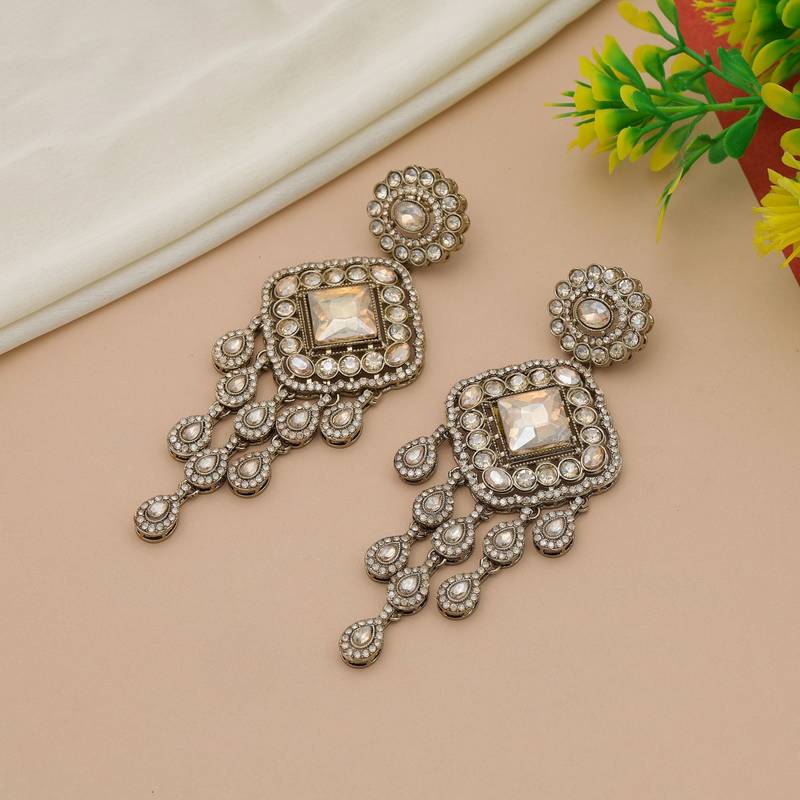 Gold color kundan earrings