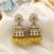 Yellow color kundan earrings
