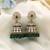 Green color kundan earrings