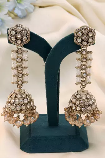 Gold color kundan earrings
