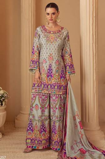 Blue crep silk free size stitched suit with digitak print & aari work