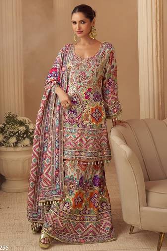 Multicolor crep silk free size stitched suit with digitak print & aari work