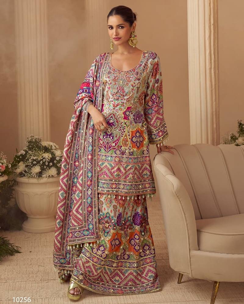 Multicolor crep silk free size stitched suit with digitak print & aari work