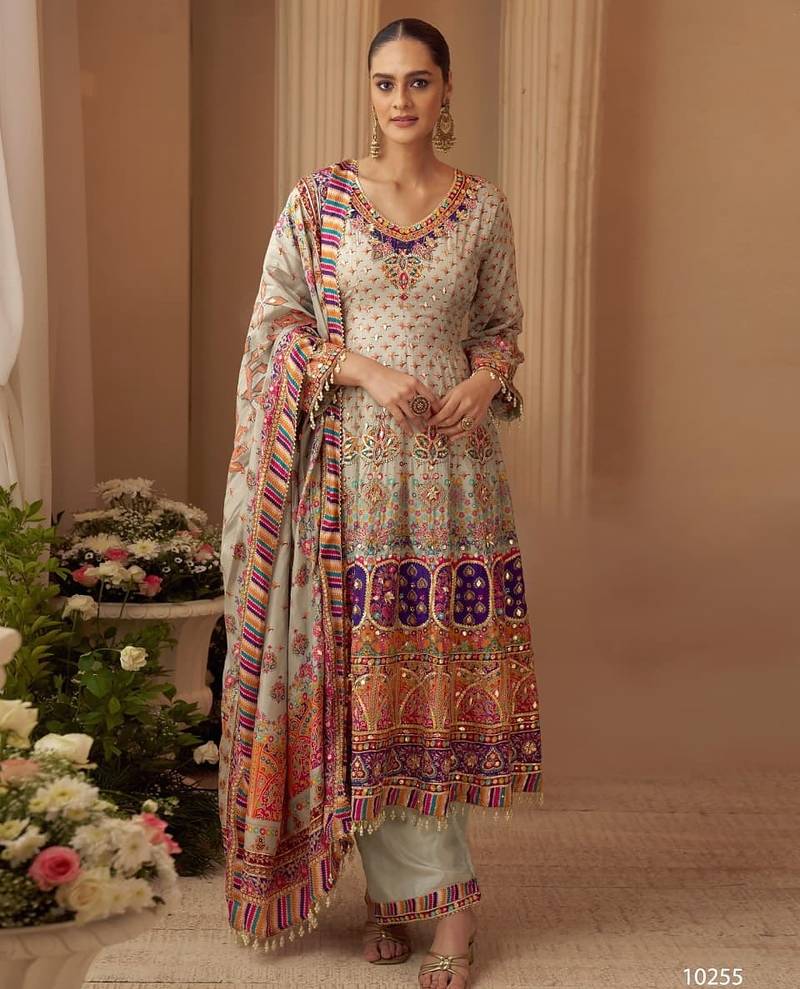 Beige crep silk free size stitched suit with digitak print & aari work