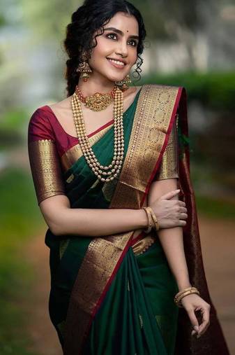 Green silk blend woven saree