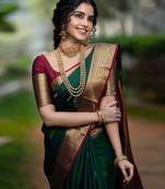 Green silk blend woven saree