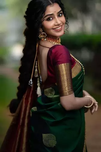 Green silk blend woven saree