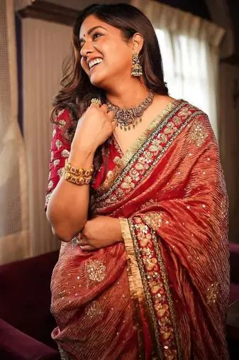 Red silk blend embroidered saree