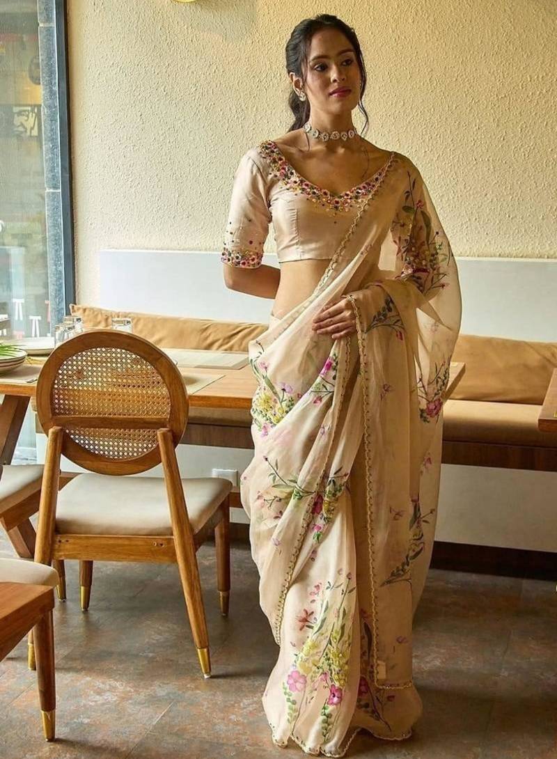 Beige silk blend embroidered saree
