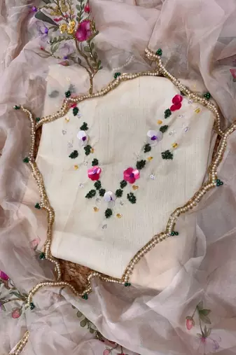 Beige silk blend embroidered saree