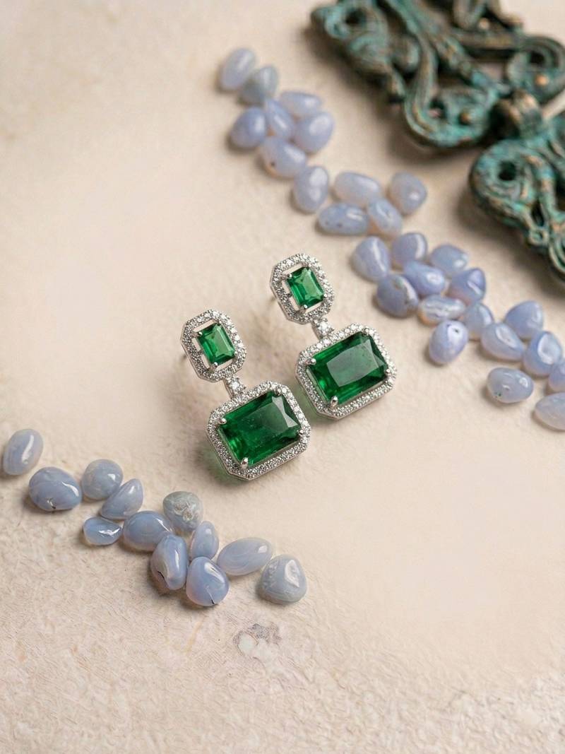Trendy american diamond green earrings