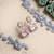 Trendy american diamond pastelpink earrings