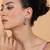 Trendy american diamond pastelpink earrings