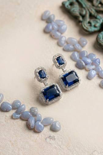 Trendy american diamond blue earrings