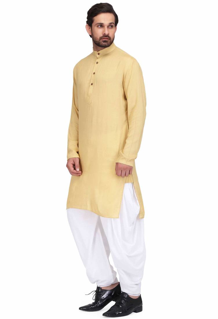 Yellow rayon kurta with white cotton dhoti style salwar
