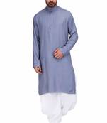 Yellow rayon kurta paired with white cotton dhoti style salwar