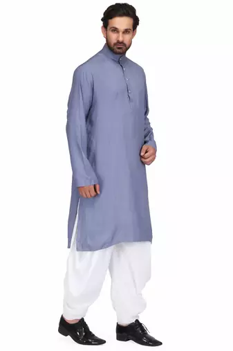 Yellow rayon kurta paired with white cotton dhoti style salwar