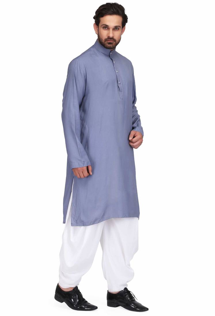 Yellow rayon kurta paired with white cotton dhoti style salwar