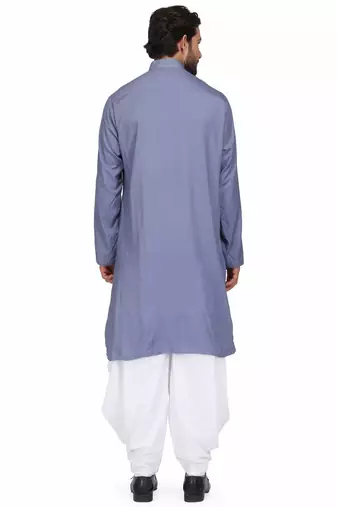 Yellow rayon kurta paired with white cotton dhoti style salwar
