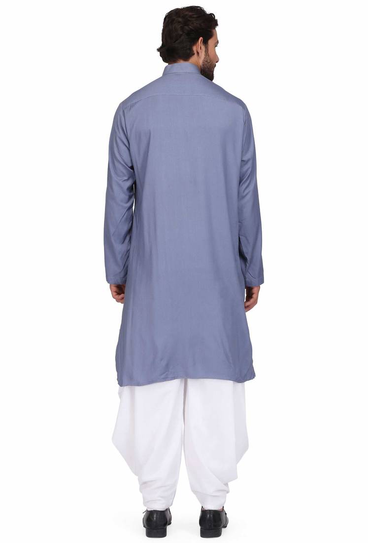 Yellow rayon kurta paired with white cotton dhoti style salwar