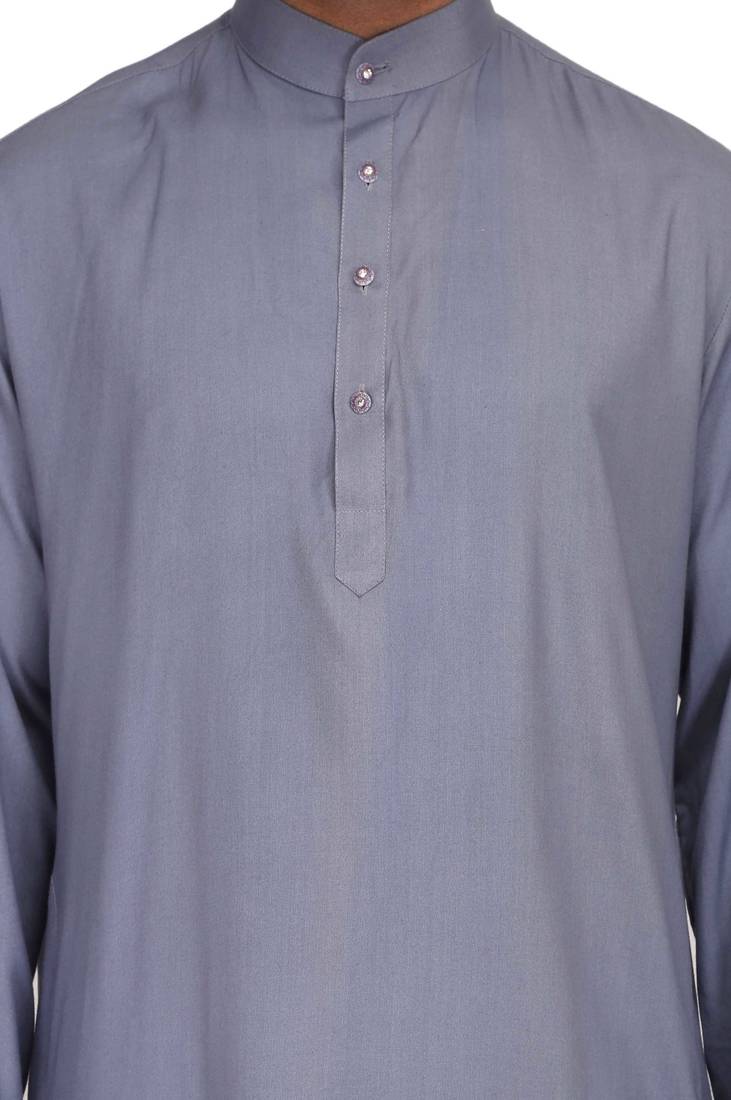 Yellow rayon kurta paired with white cotton dhoti style salwar