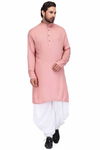 Dusty pink rayon kurta paired with white cotton dhoti style salwar