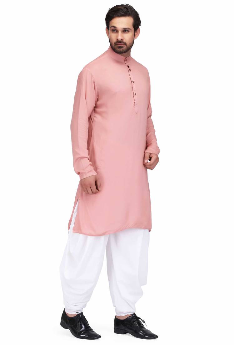 Dusty pink rayon kurta paired with white cotton dhoti style salwar
