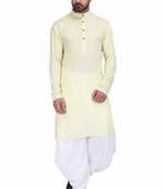 Light yellow rayon kurta paired with white cotton dhoti style salwar
