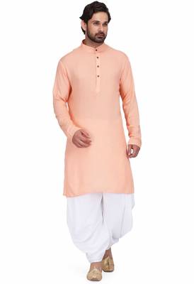 Peach rayon kurta paired with white cotton dhoti style salwar 1