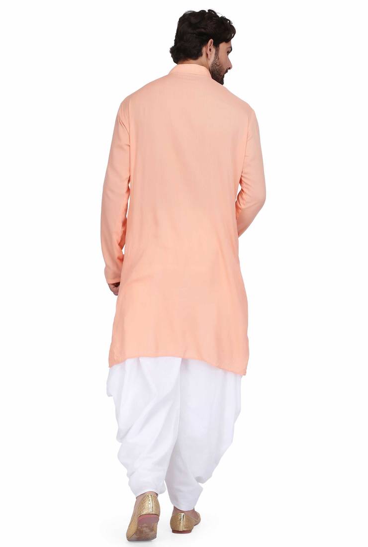 Peach rayon kurta paired with white cotton dhoti style salwar