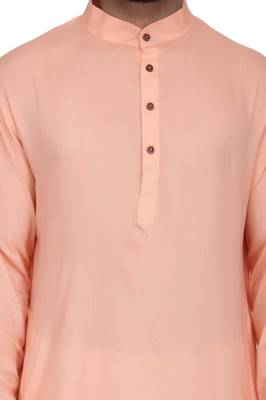 Peach rayon kurta paired with white cotton dhoti style salwar 4