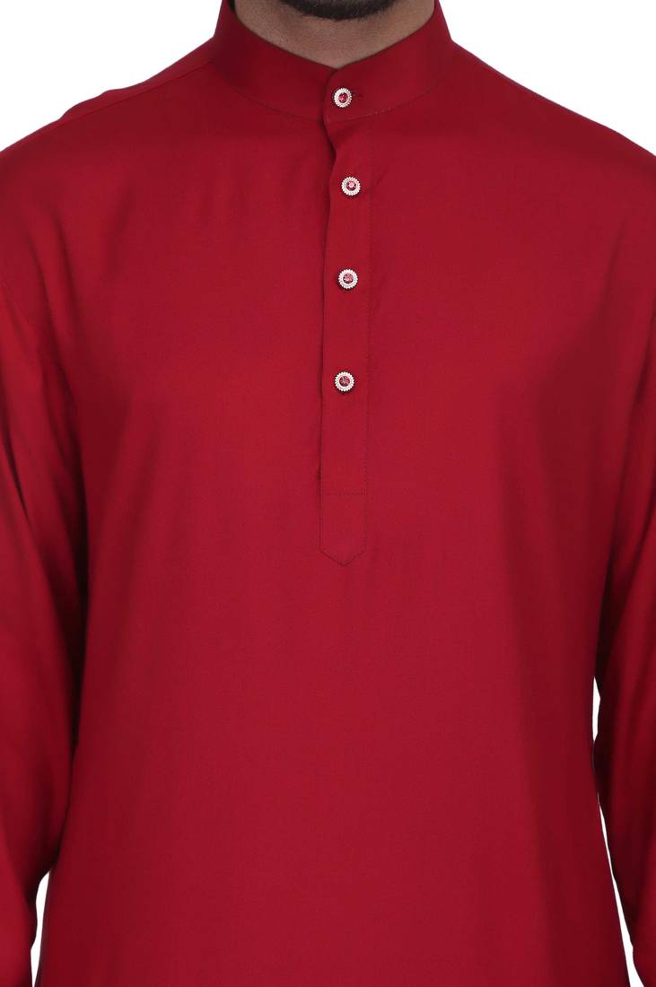 Maroon rayon kurta paired with white cotton dhoti style salwar