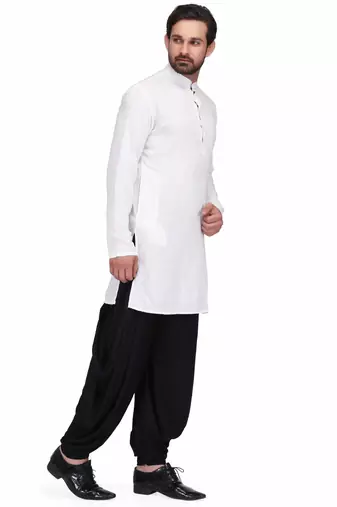 White cotton kurta paired with black rayon dhoti style salwar