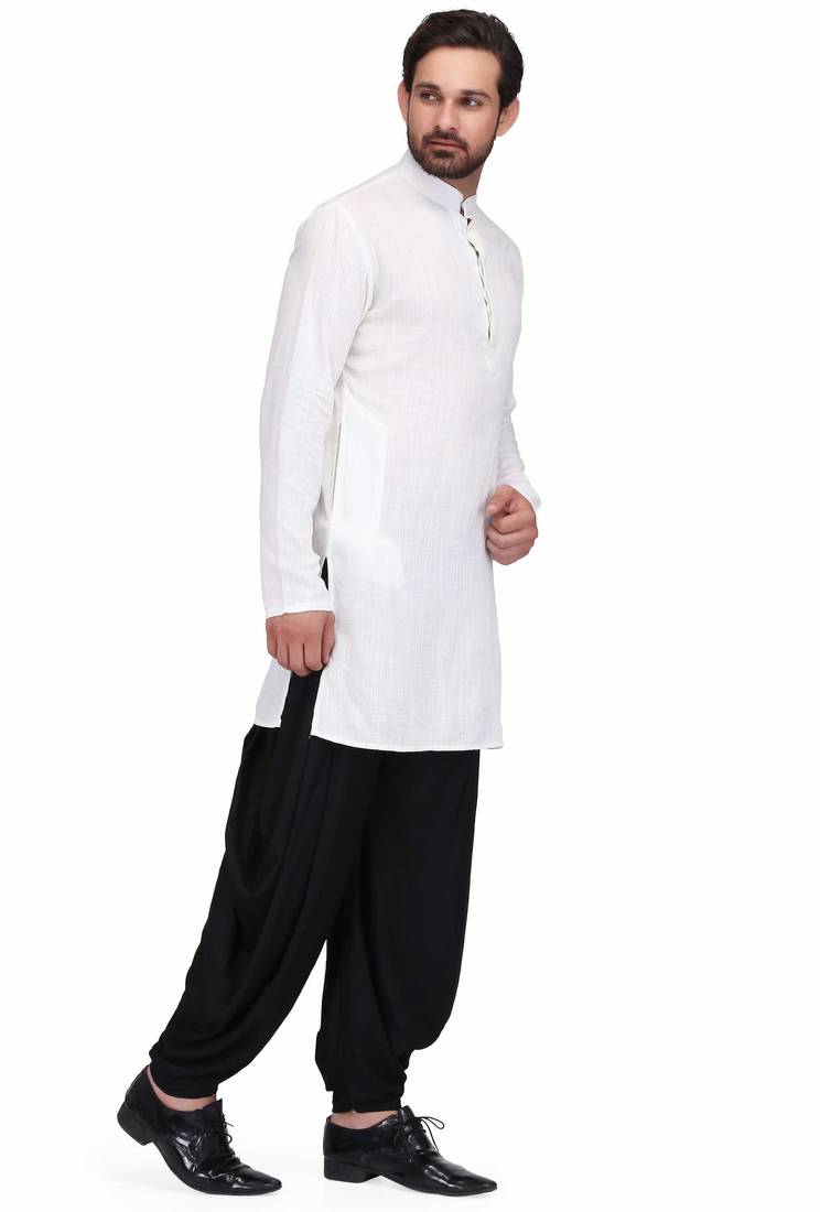 White cotton kurta paired with black rayon dhoti style salwar