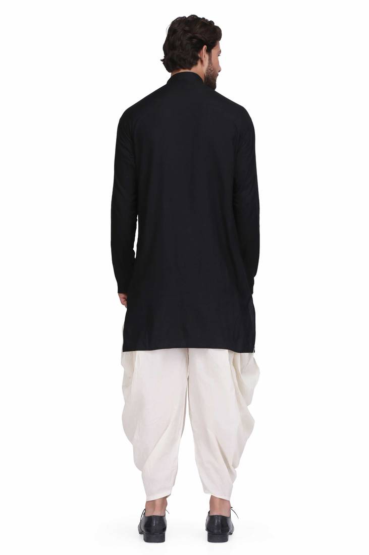 Black rayon kurta paired with white cotton dhoti style salwar