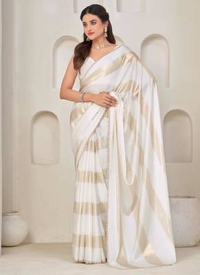 White color satin silk blend with foil patta & zircon handwork border saree 1