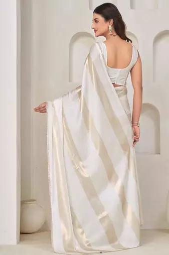 White color satin silk with foil patta & zircon handwork border saree