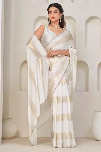 White color satin silk with foil patta & zircon handwork border saree
