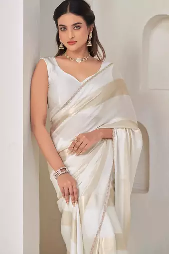 White color satin silk with foil patta & zircon handwork border saree