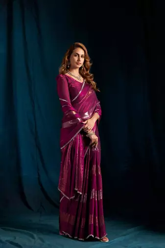 Wine color satin silk with foil patta & zircon handwork border saree
