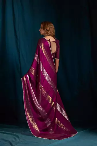 Wine color satin silk with foil patta & zircon handwork border saree