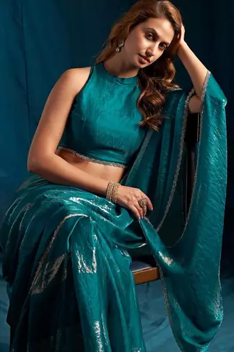 Rama color satin silk with foil patta & zircon handwork border saree