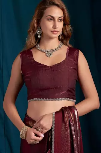 Maroon color satin silk with foil patta & zircon handwork border saree