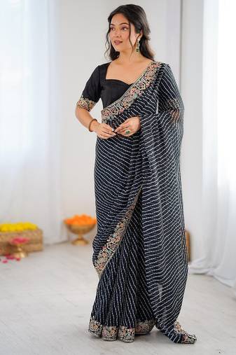 Black color faux georgette bandhni print & embroidered border saree