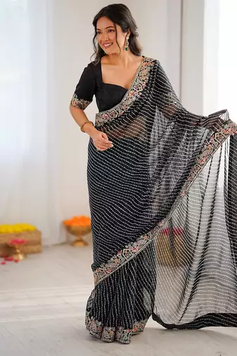 Black color faux georgette bandhni print & embroidered border saree