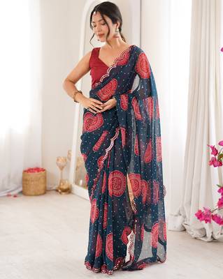  georgette bandhani gola print saree with mirror work & cutwork border 1