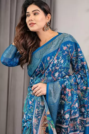 Graceful handloom linen weaved with golden zari saree with artistic floral print & tassels