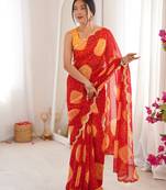 Heavy georgette bandhani gola print saree with mirror work & cutwork border