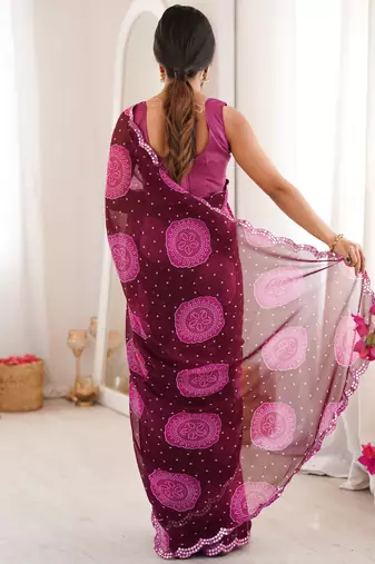  georgette bandhani gola print saree with mirror work & cutwork border